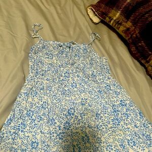 A blue floral white dress 🧚🏻‍♂️🧚🏻‍♂️